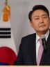 South Korea president banned from foreign travel