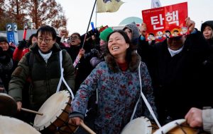 South Korea’s MPs vote to impeach president over martial law debacle