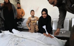 ‘A new tragic morning’: Israeli attacks kill 77 across Gaza